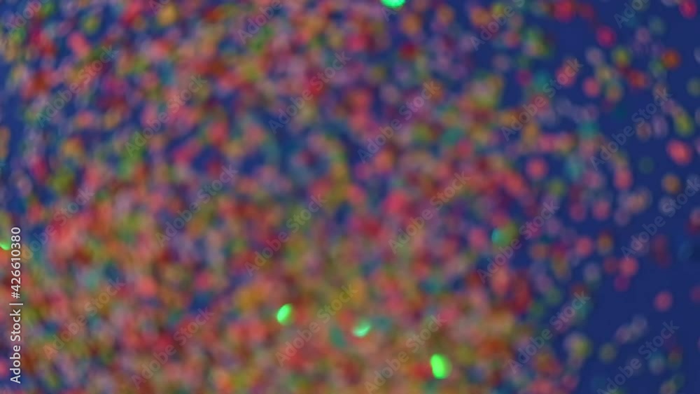 Vídeo do Stock: Close up Confetti explosion on black background. Slow ...
