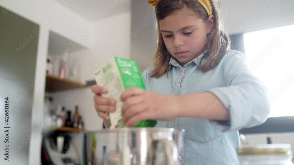 10 year old girl baking cookies