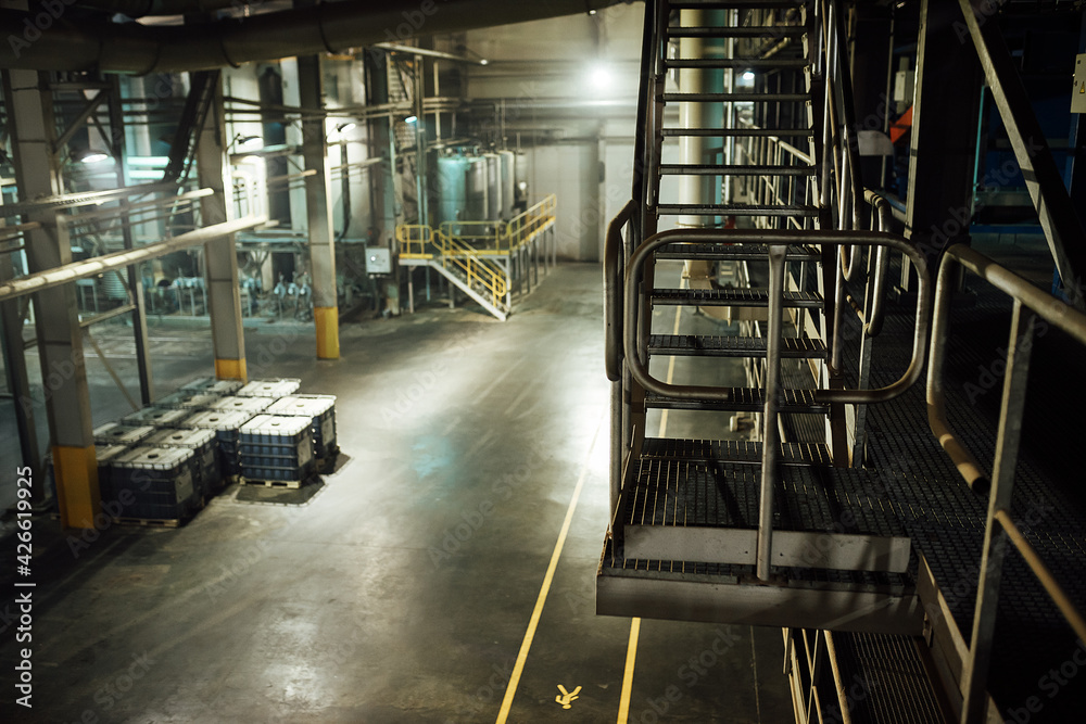 railing of the factory shop. fences for the safety of employees at work. industrial landscape of the factory interior railing of the factory shop. fences for the safety of employees at work. industrial landscape of the factory interior