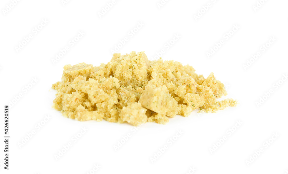 Aromatic crumbled bouillon cube on white background Aromatic crumbled bouillon cube on white background