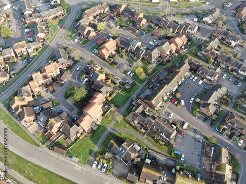 aerial view of modern neat housing estate in early morning sun