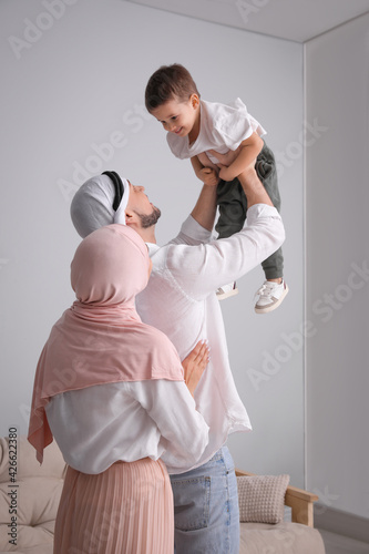 Photography Happy Muslim family spending time together at home