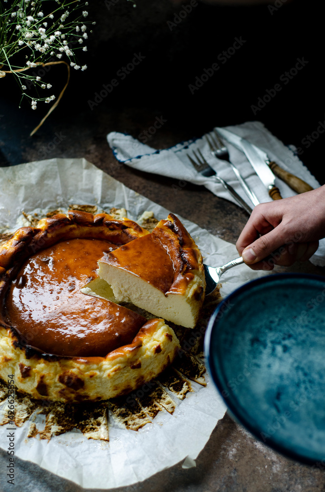 Fototapeta premium San Sebastian Cheesecake on Black Background
