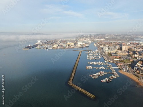 aerial view of Poole harbour and the historic Quay area seen on a sunny calm morning