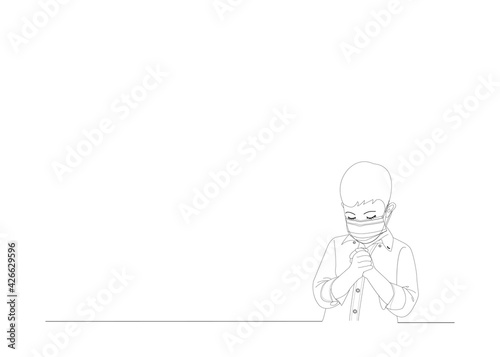 Coloring picture of a boy wearing a medicine mask praying.