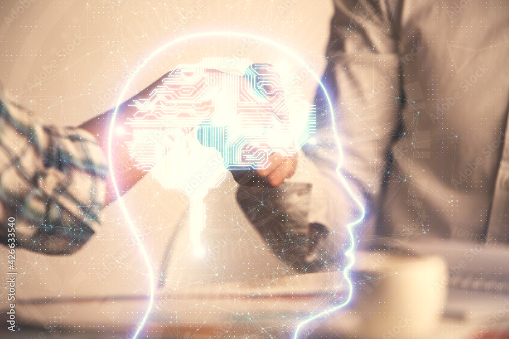 Double exposure of brain hologram and handshake of two men. Partnership in IT industry concept. Double exposure of brain hologram and handshake of two men. Partnership in IT industry concept.