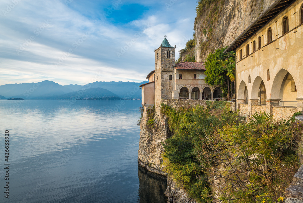 Lake Maggiore, Italy. Eremo di  Santa Caterina del Sasso (Hermitage of Saint Catherine of stone - XIII cen) overhanging a big European lake. It is one of the most fascinating historical sites of the l