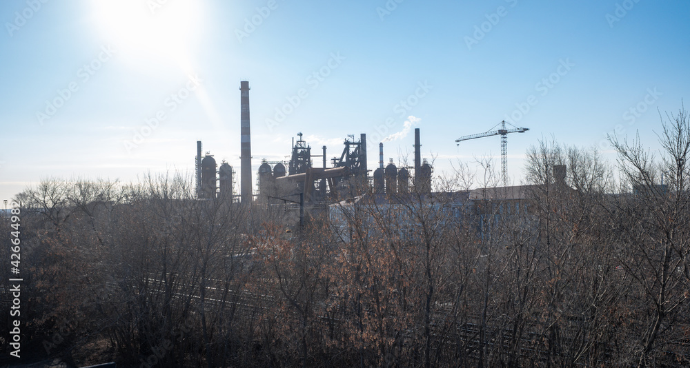 factory chimneys on a blue sky background