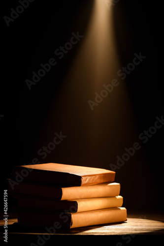 Old books on table against ...