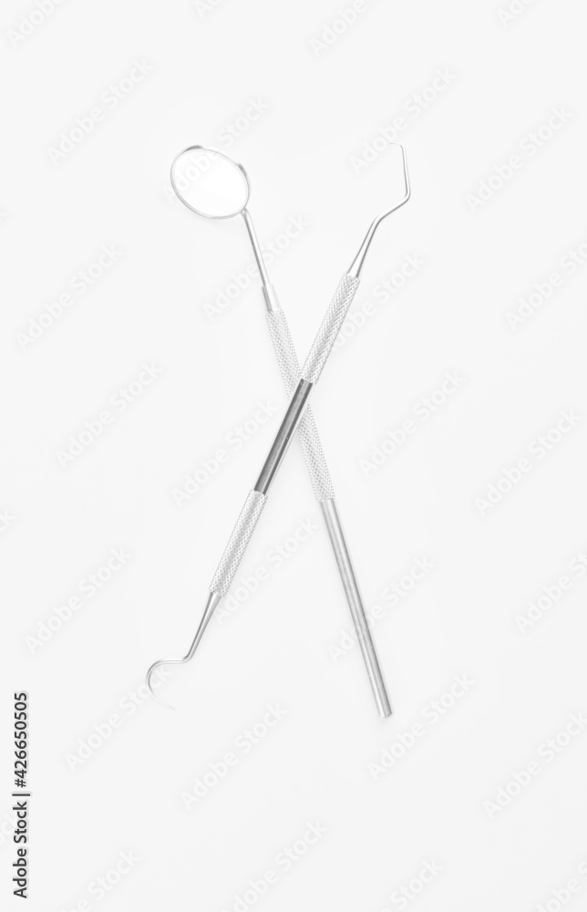 Dentist's tools on white background Dentist's tools on white background