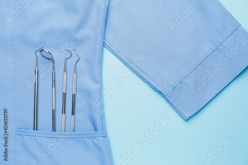 Dentist's tools with coat o...