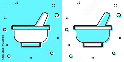 Black line Mortar and pestle icon isolated on green and white background. Random dynamic shapes. Vector