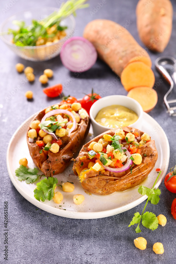 baked sweet potato with vegetables