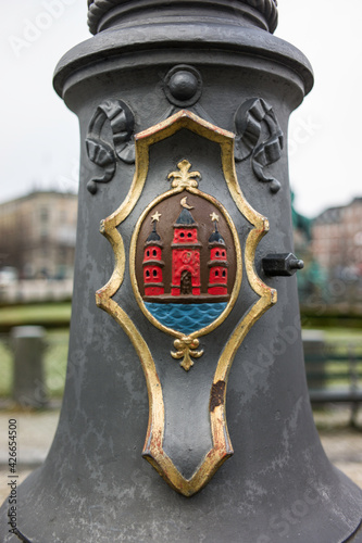Coat of arms of Copenhagen on a lamppost. The left and right towers represent the castle of Absalon