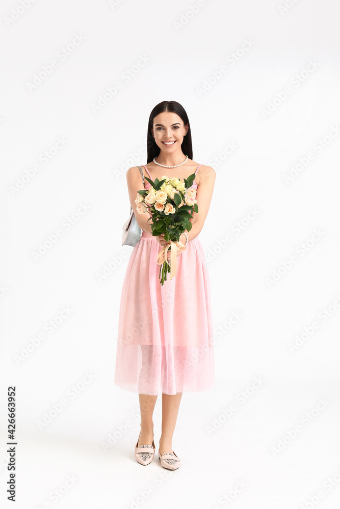Beautiful woman with flowers on white background. International Women's Day celebration