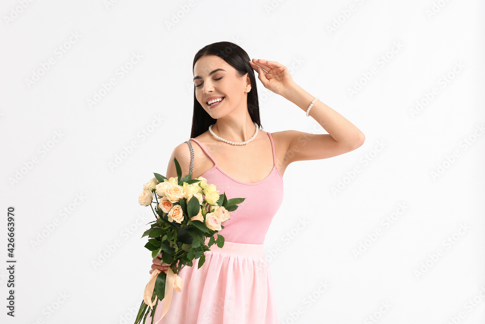 Beautiful woman with flowers on white background. International Women's Day celebration Beautiful woman with flowers on white background. International Women's Day celebration