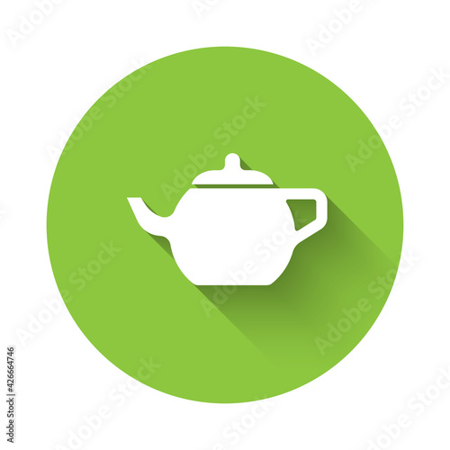 White Traditional Chinese tea ceremony icon isolated with long shadow. Teapot with cup. Green circle button. Vector