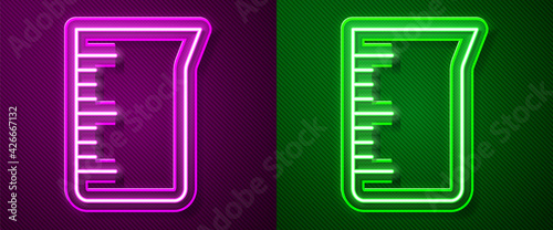 Glowing neon line Laboratory glassware or beaker icon isolated on purple and green background. Vector