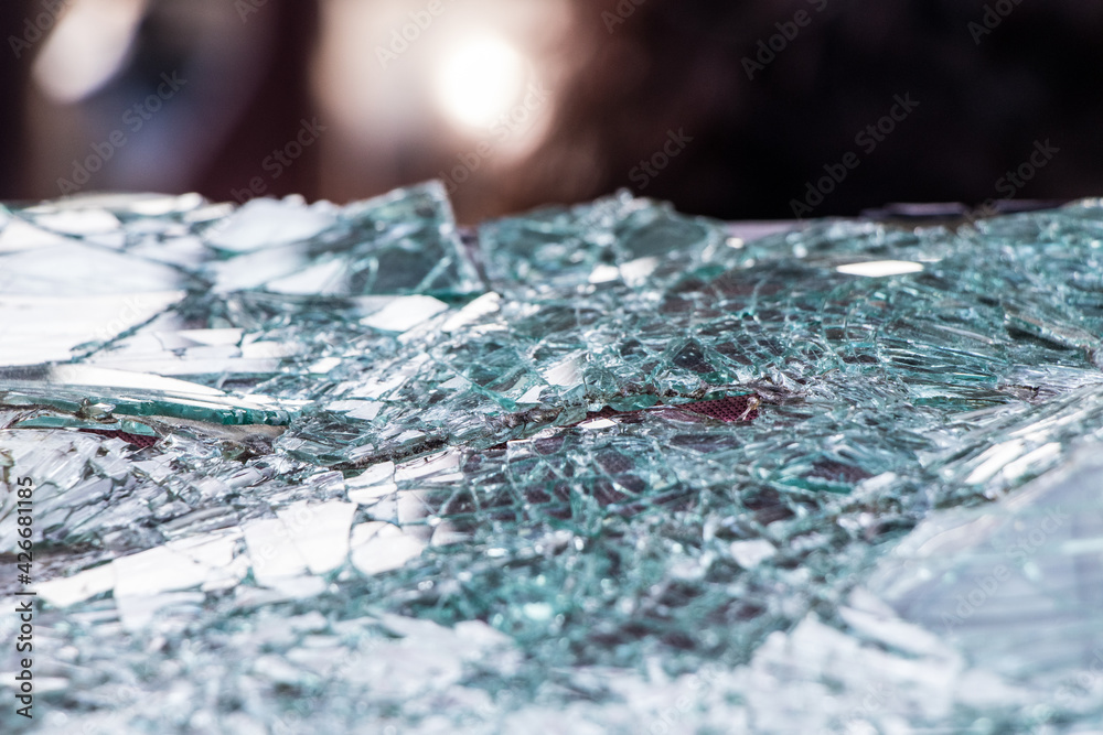 Naklejka premium Broken glass pattern at an abandoned factory
