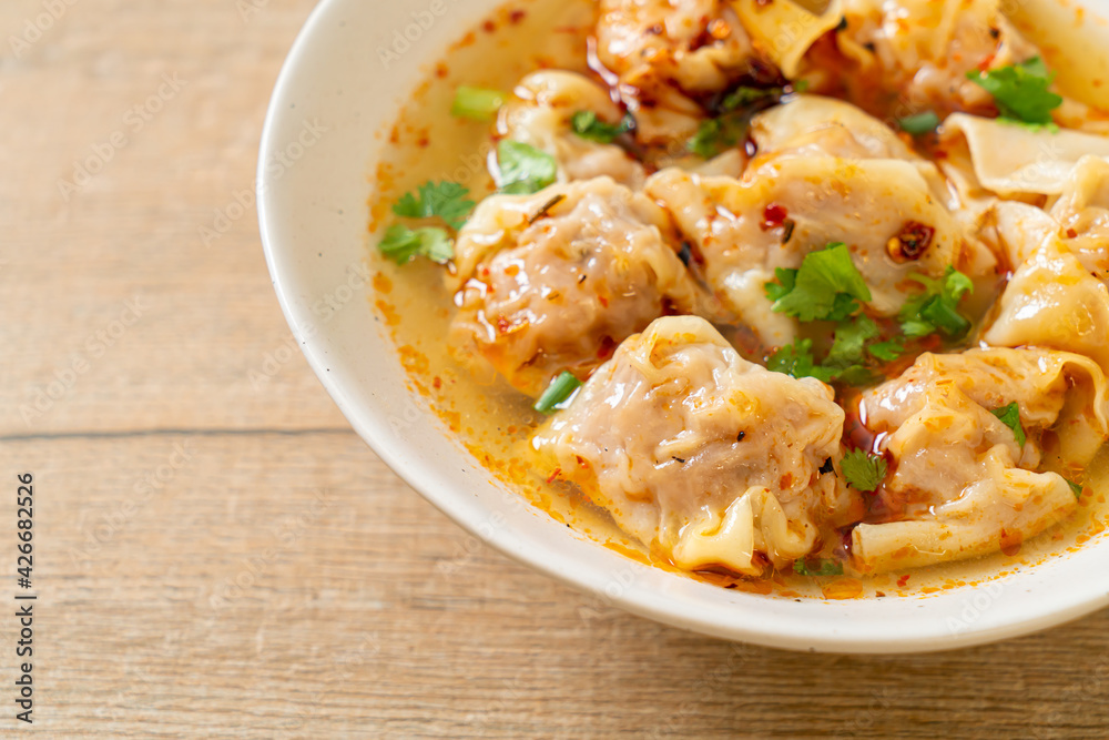 pork wonton soup or pork dumplings soup with roasted chili pork wonton soup or pork dumplings soup with roasted chili