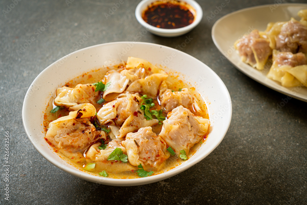 pork wonton soup or pork dumplings soup with roasted chili pork wonton soup or pork dumplings soup with roasted chili