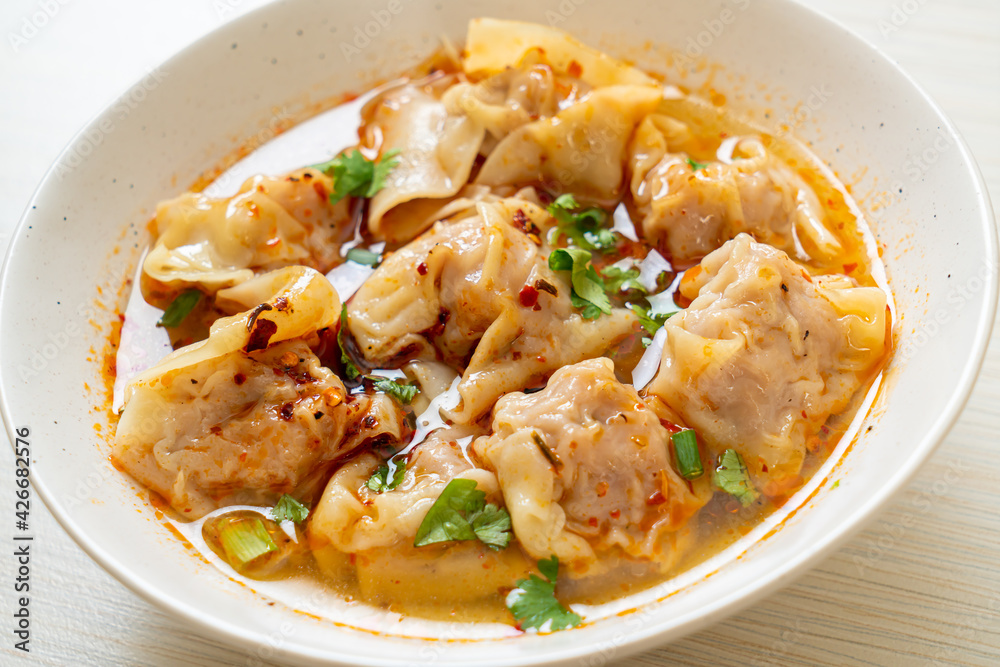 pork wonton soup or pork dumplings soup with roasted chili pork wonton soup or pork dumplings soup with roasted chili