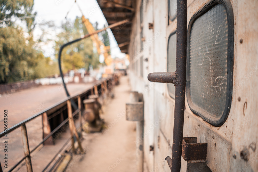 Steampunk. A hero on a river barge surrounded by steel mechanisms. A man with a weapon. Steampunk. A hero on a river barge surrounded by steel mechanisms. A man with a weapon.