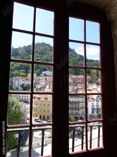 A view of the town of Sintra  Portugal  through the window of Sintra Palace