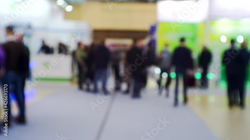 Wallpaper Mural Modern city life. Abstract blurred background on business theme. Blurry defocused video. Unrecognizable people in a large modern building. Torontodigital.ca