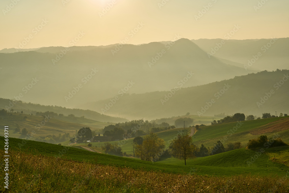 Scenic nature and hills at sunrise, Emilia-Romagna, Italy. 