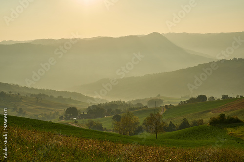 Scenic nature and hills at sunrise, Emilia-Romagna, Italy. 