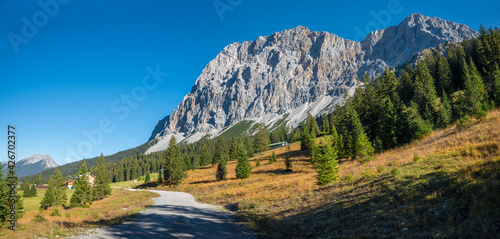 hiking trail to Ehrwalder Almbahn upper station, famous Zugspitze mountain in the background