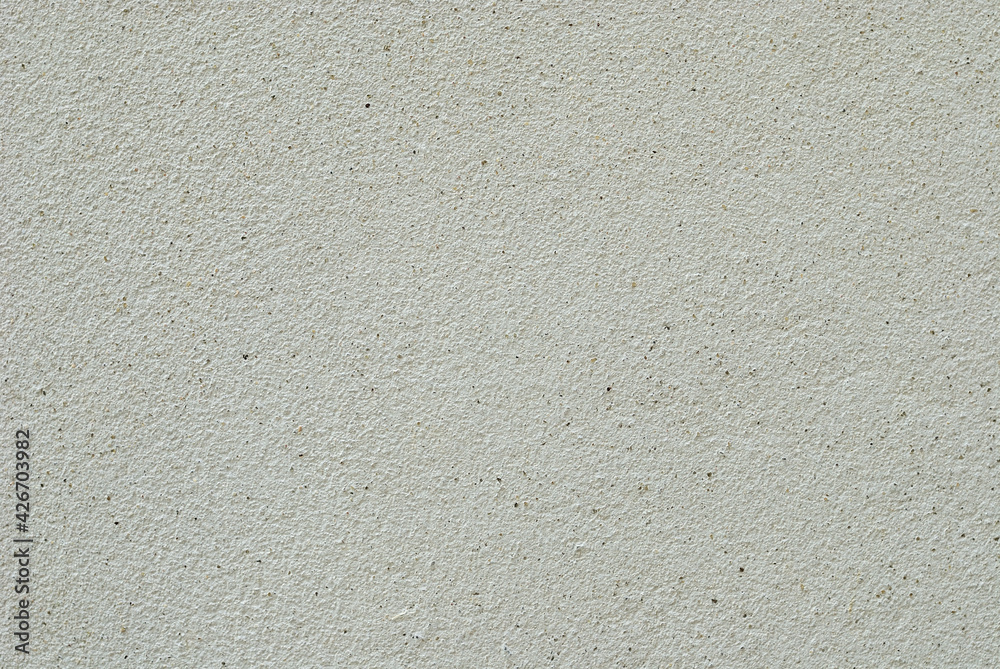 Raw concrete surface in unpainted pale earth tone color. Minimal and  peaceful feeling image background. 