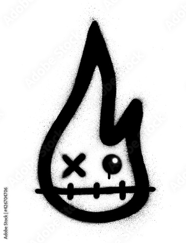 graffiti flame character sprayed in black over white