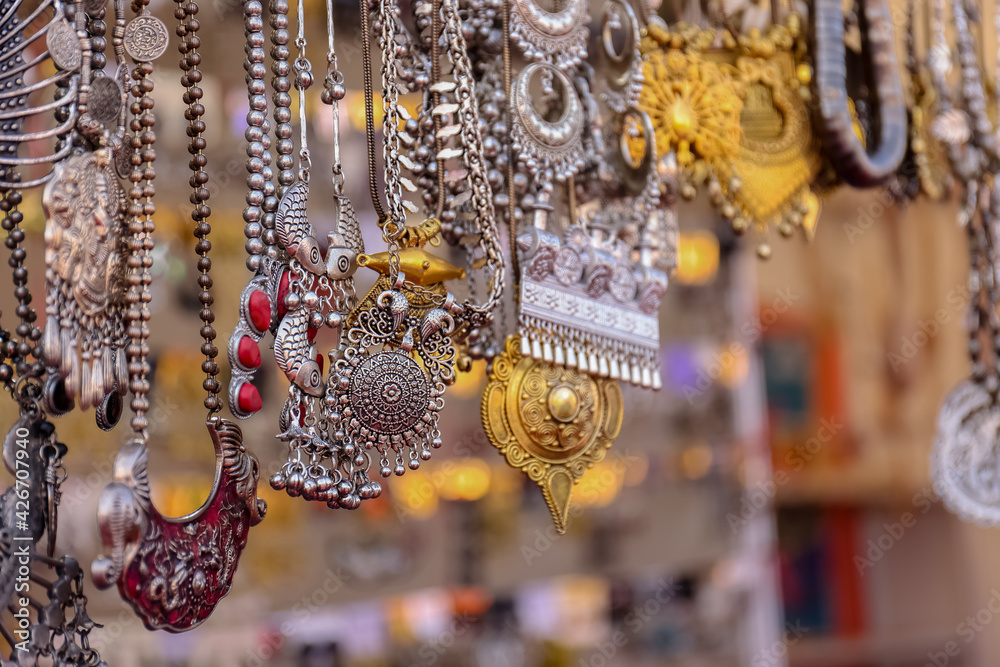 Indian ethnic jewellery of gold and silver on display.