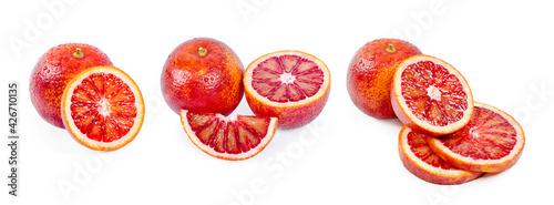 Bloody oranges whole, cut in half and sliced isolated on white background. Red sicilian orange fruit as package design element, banner.
