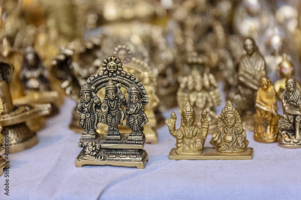 Brass products of Indian god  in Indian souvenir store.