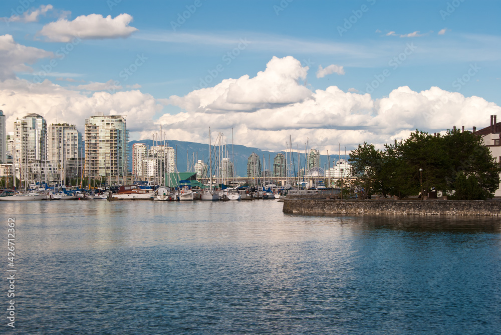 A view of sunny Yaletown from False Creek Sea walk. Downtown of Vancouver. Canada.