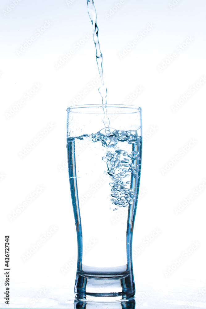 Pour water into a glass Pour water into a glass
