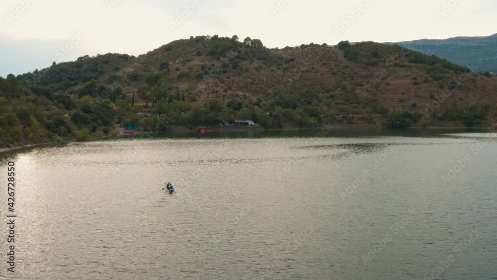 Arial Drone Shot of people doing kayak in a lake Arial Drone Shot of people doing kayak in a lake