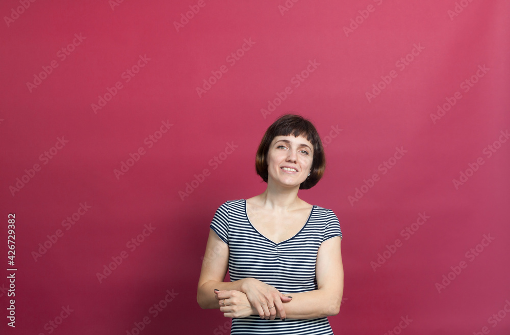 Russian girl in dress on pink background Russian girl in dress on pink background