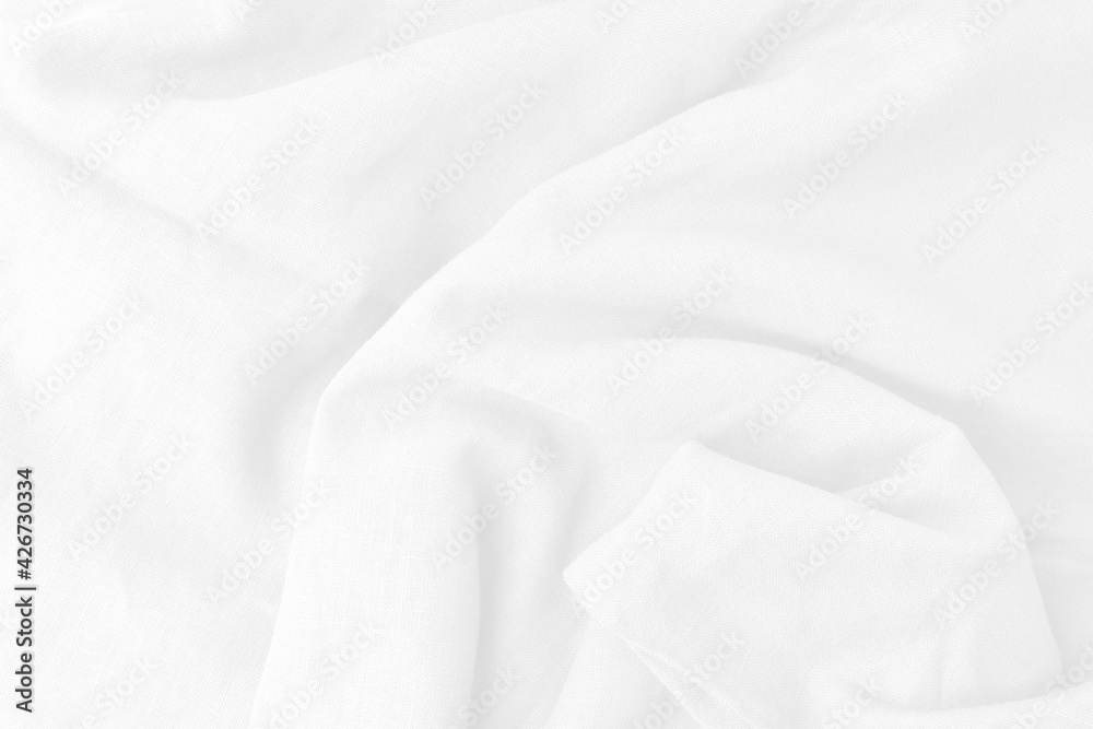 Texture white cotton fabric has a wavy fold for the design backdrop.
