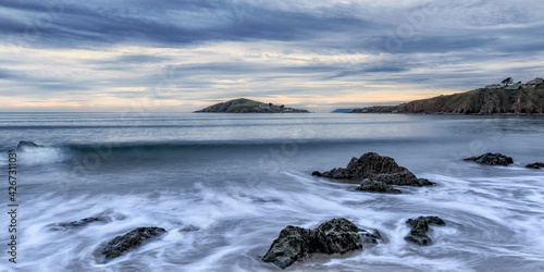 Calm seas at Bantham beach with Burgh Island in the background © Paul
