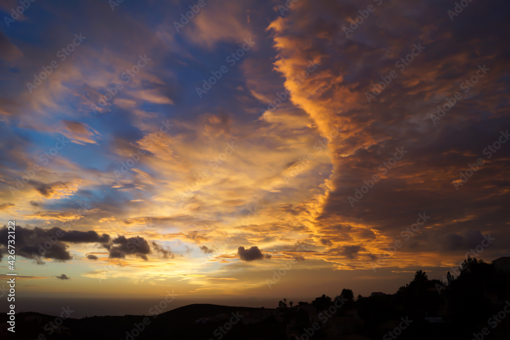 scenic clouds at sunrise over the mediterranean sea