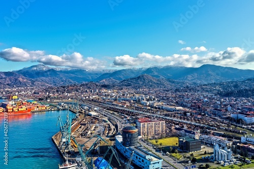 Aerial view of the port and mountains in the background of Batumi, Georgia