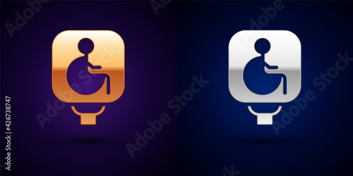 Gold and silver Disabled wheelchair icon isolated on black background. Disabled handicap sign. Vector