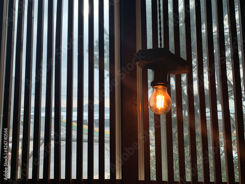 A light lit by a comb-patterned window 