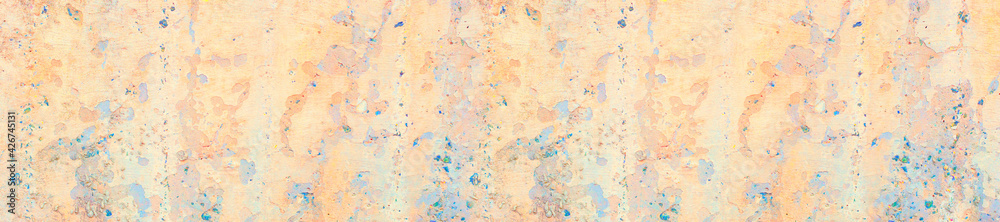 Panorama old concrete wall covered with pastel pale colorful paint. Panorama old concrete wall covered with pastel pale colorful paint.
