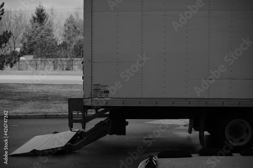 Rear Of Moving Van - Black And White