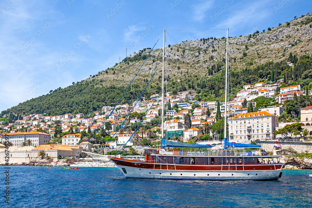 Naklejka premium Touristic ship by the shore in Dubrovnik in Croatia